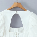 Iride corset peplum top