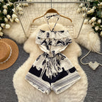 Melania Halter Ruffle Print Romper