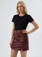 Apollonia Faux Leather Slit Mini Skirt on model