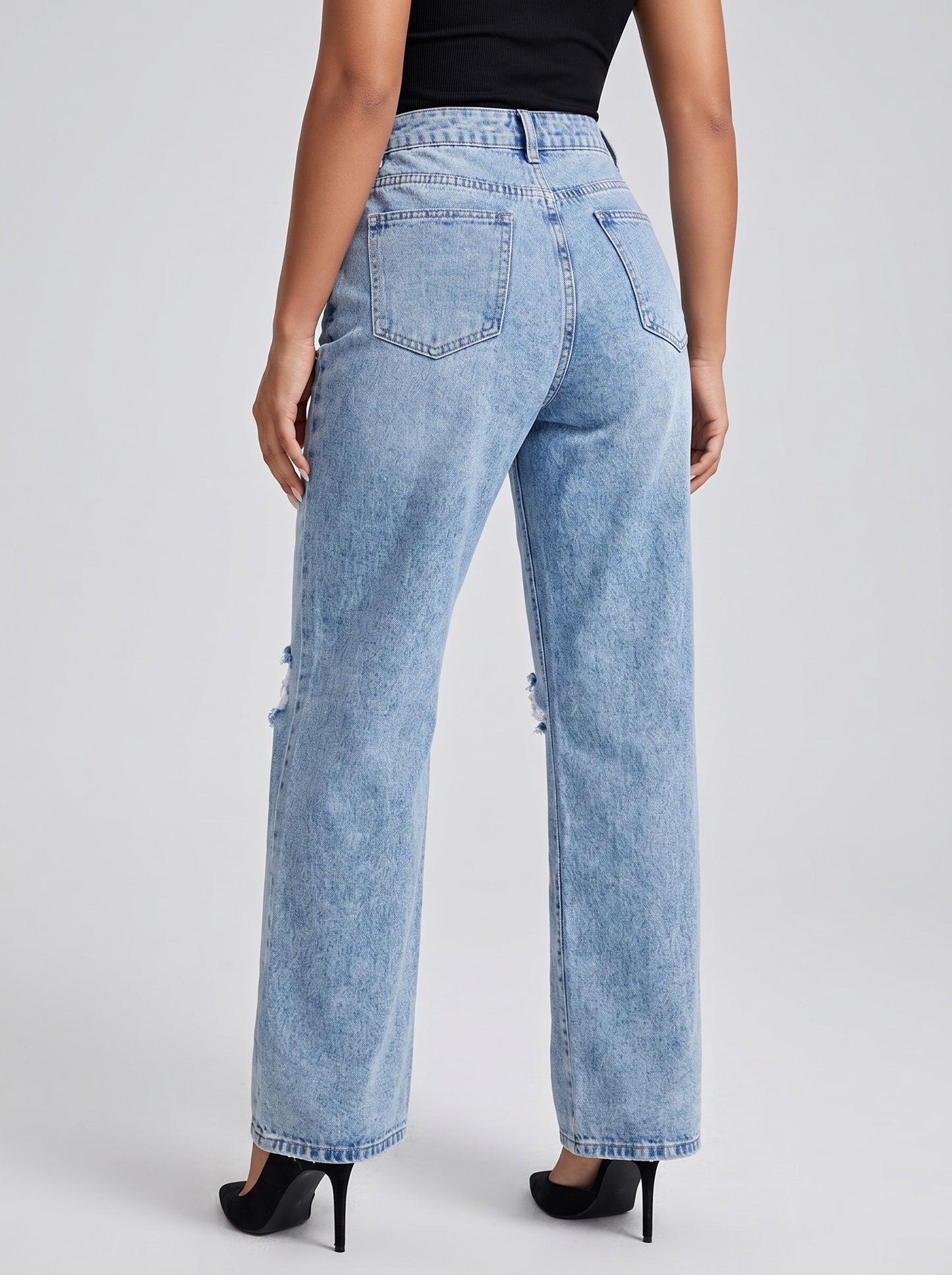 Greta High-Rise Ripped Straight Jeans on model
