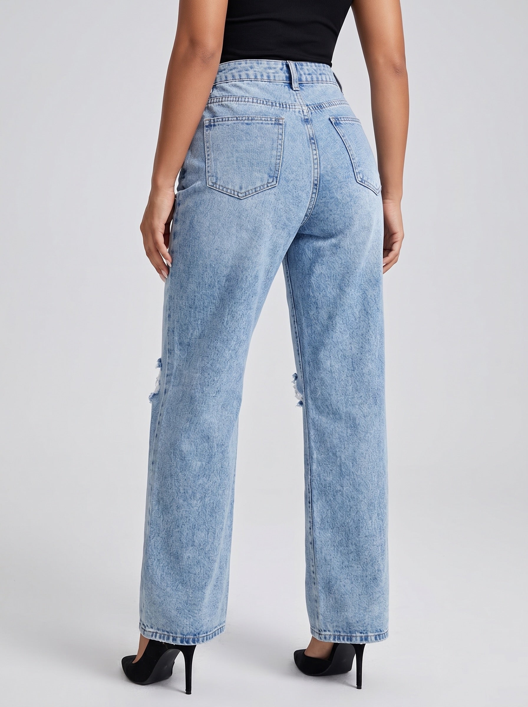Greta High-Rise Ripped Straight Jeans on model