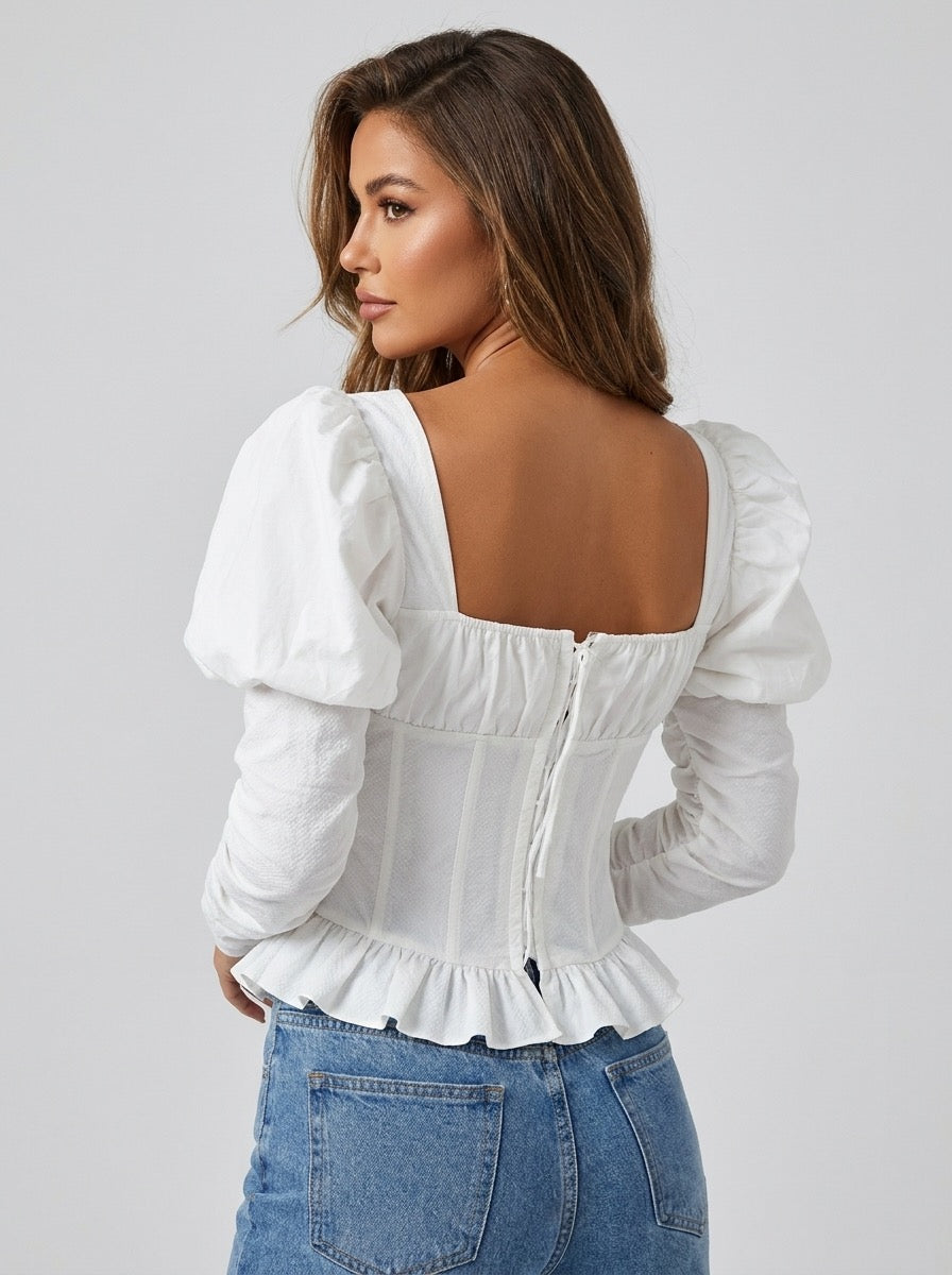 Iride Corset Peplum Puff-Sleeve Top on model