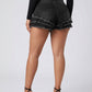Mara High-Waist Frayed Denim Shorts on model