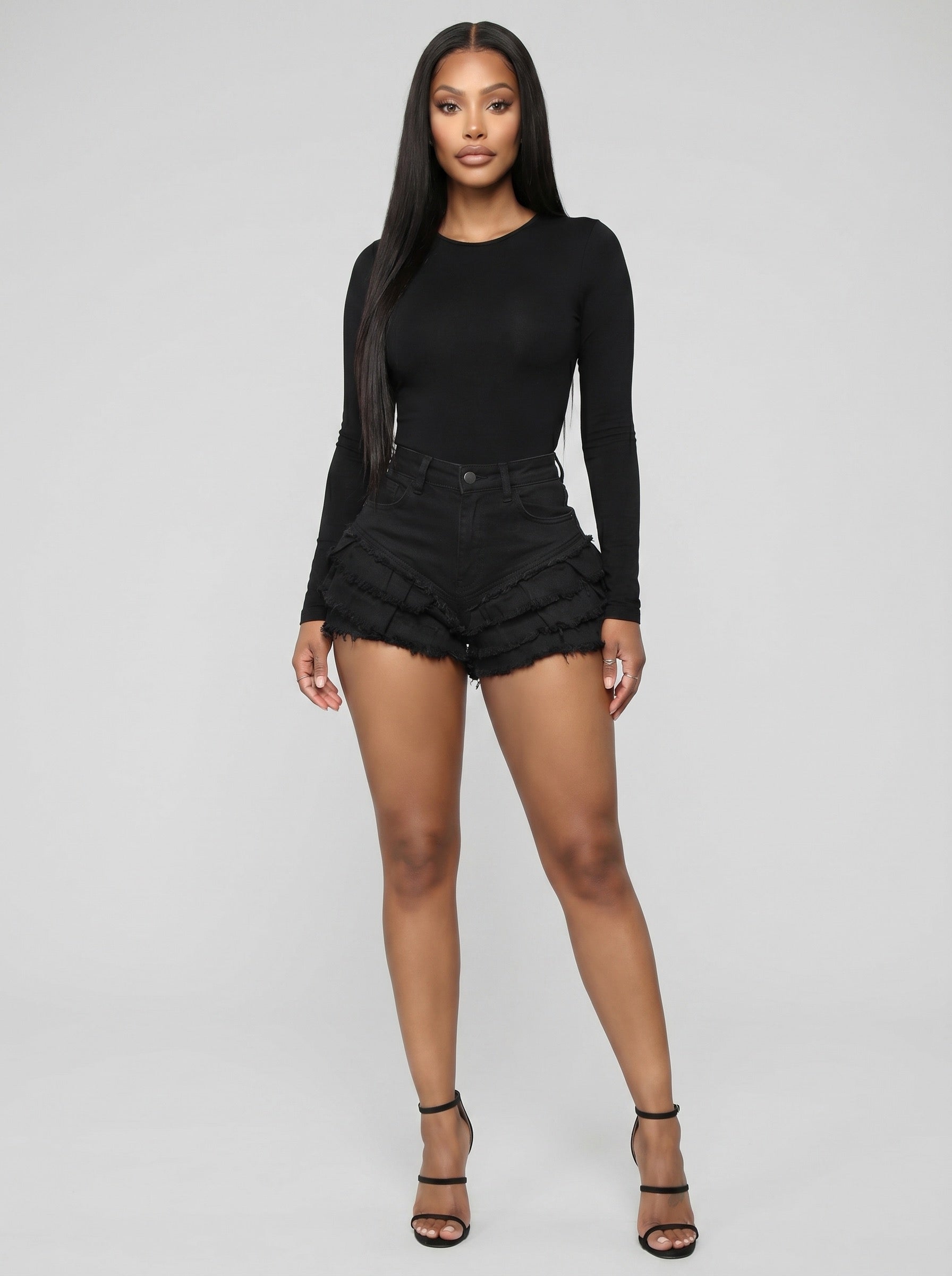 Mara High-Waist Frayed Denim Shorts on model