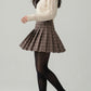 Mirabella Pleated Plaid Skirt on model