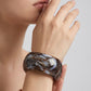 Noa Chunky Resin Bangle on model
