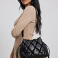Nuvola Quilted Pillow Shoulder Bag on model