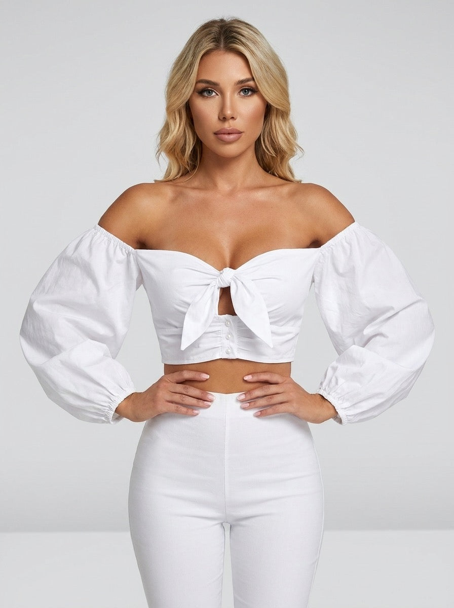 Lucinda Off-Shoulder Puff-Sleeve Bow Crop Top on model
